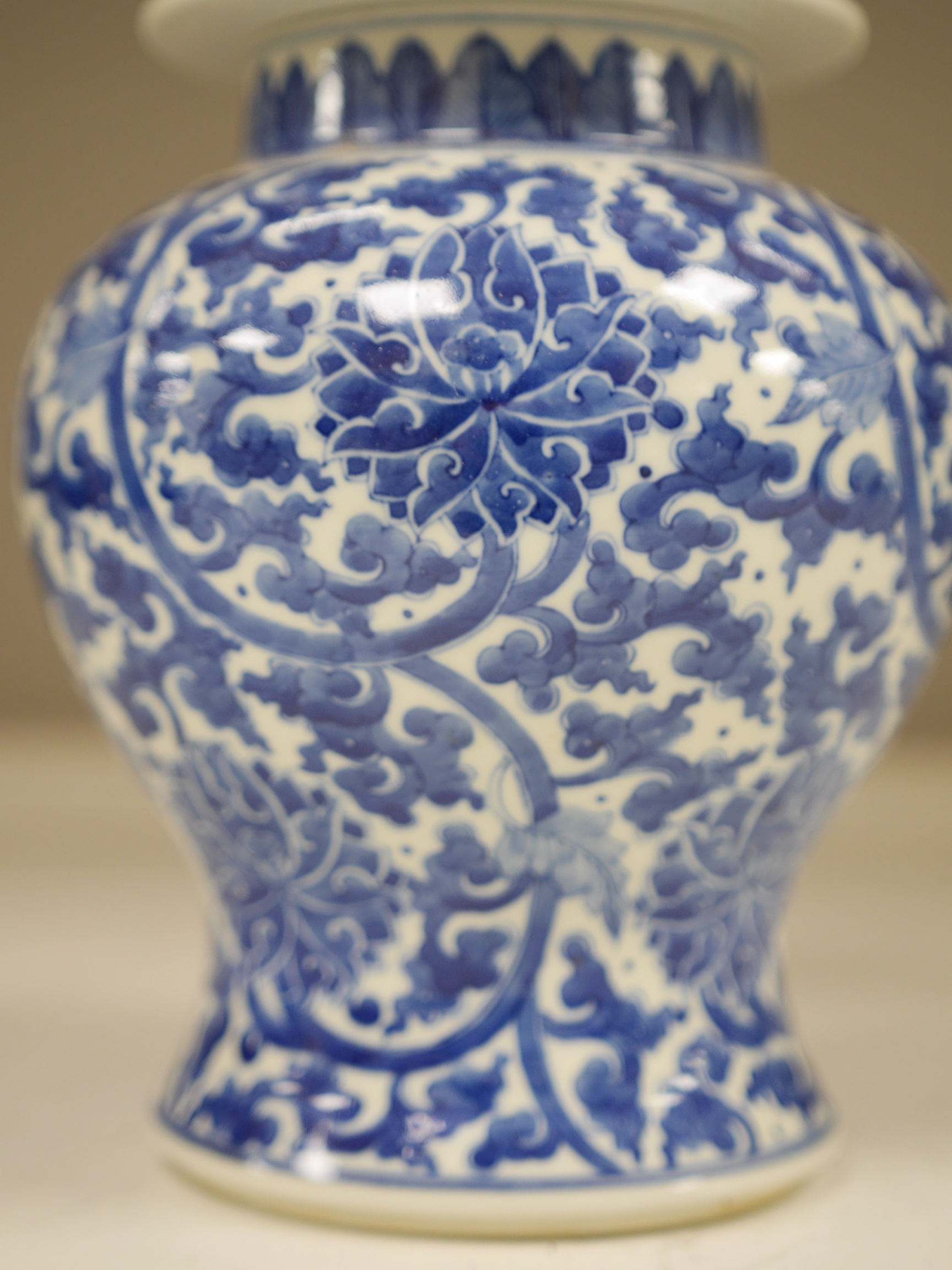 A Chinese blue and white baluster vase and cover, 32cm high. Condition - good